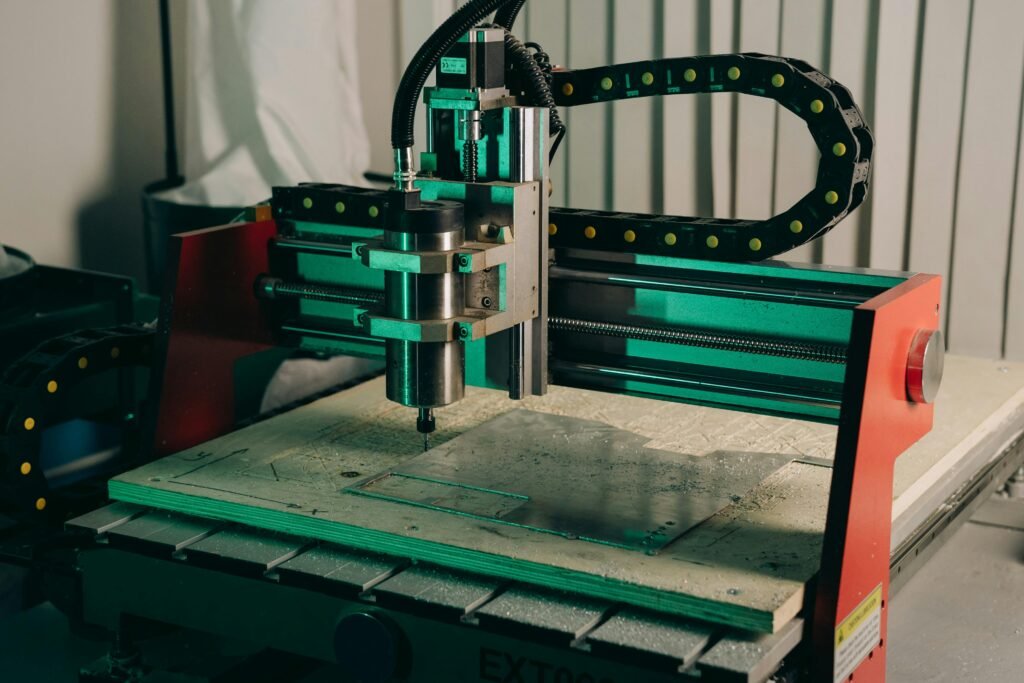 pexels-photo-9242913-9242913 Close-up of a CNC machine in action in an industrial setting.